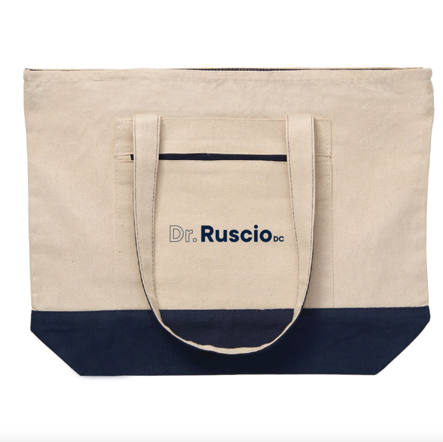 Canvas tote bag with navy bottom section and 'Dr. Ruscio DC' logo on a natural background
